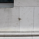 23 Wall St. still bears the scars of the 1920 bombing.